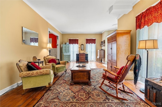 living room with ornamental molding and dark wood-type flooring