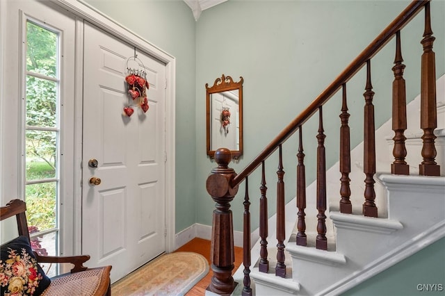 foyer entrance with hardwood / wood-style flooring