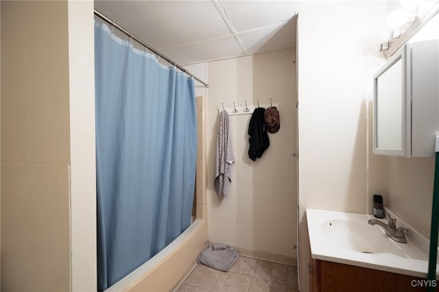 bathroom featuring vanity, shower / tub combo with curtain, and tile patterned floors