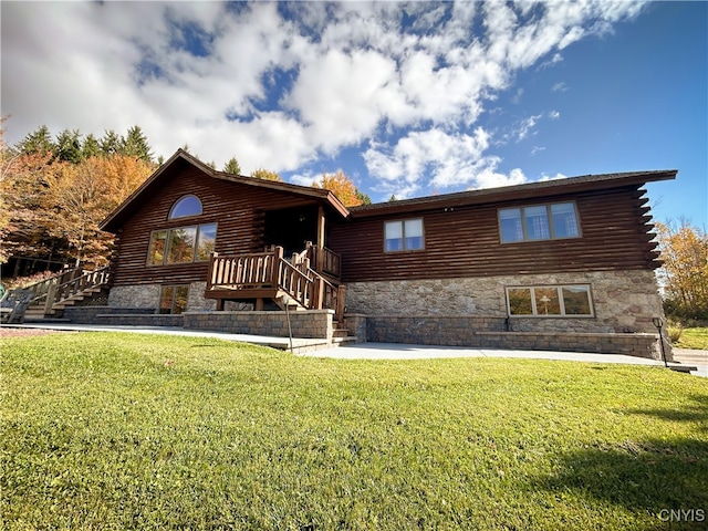 log home with a front lawn