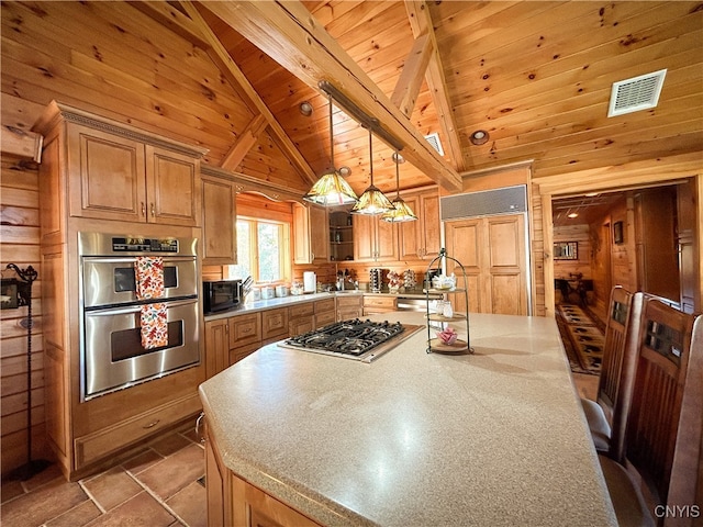 kitchen featuring appliances with stainless steel finishes, wood ceiling, wooden walls, pendant lighting, and lofted ceiling with beams