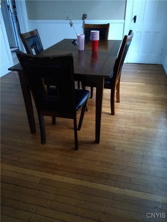 dining room with dark hardwood / wood-style floors