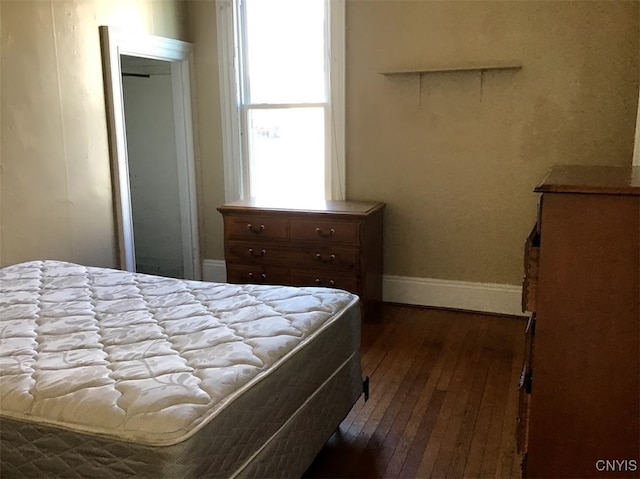 bedroom featuring hardwood / wood-style flooring