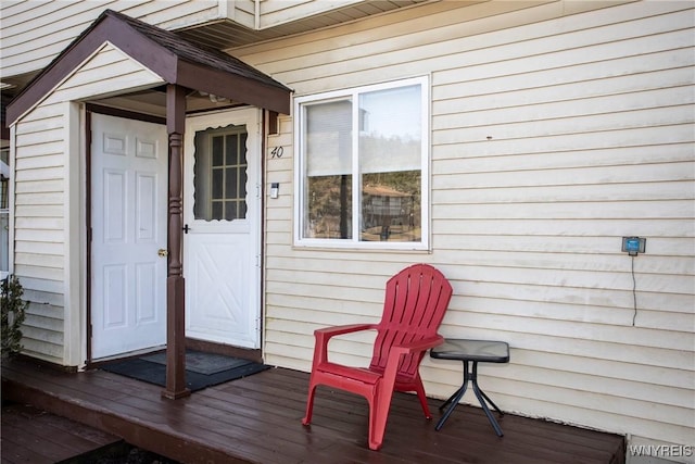 doorway to property featuring a deck