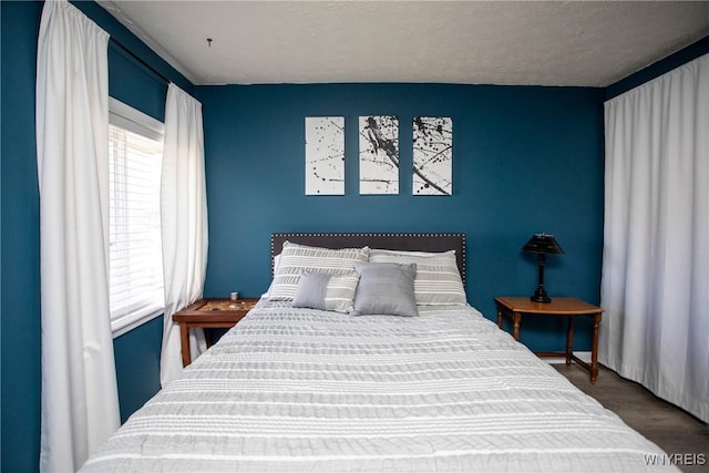 bedroom with wood-type flooring