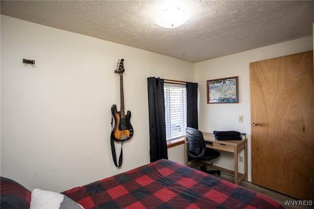 bedroom with a textured ceiling