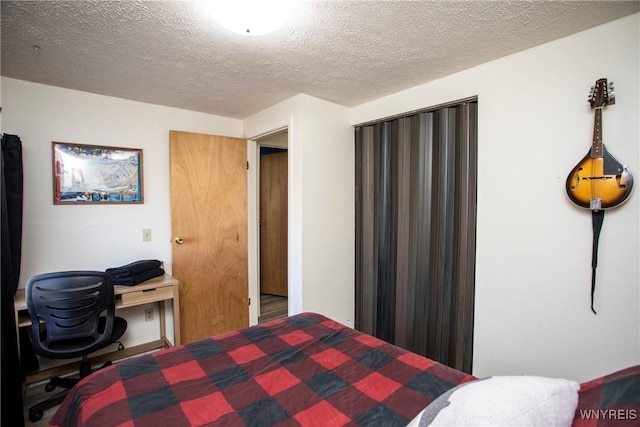 bedroom with a textured ceiling