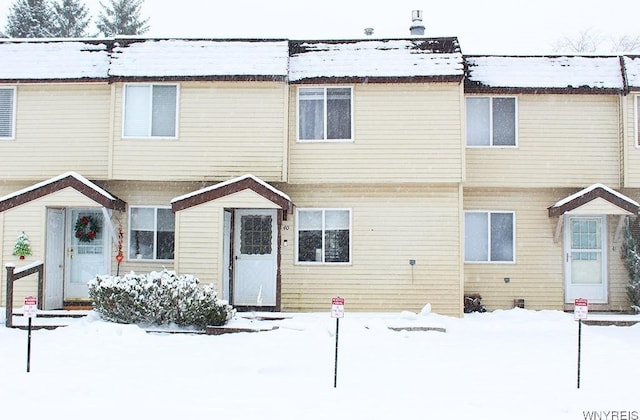 view of snow covered property