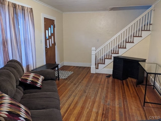 living room featuring wood-type flooring and crown molding