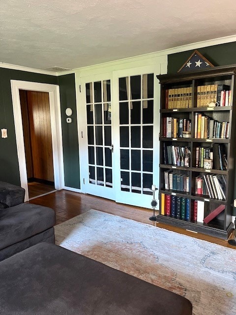 sitting room featuring a textured ceiling