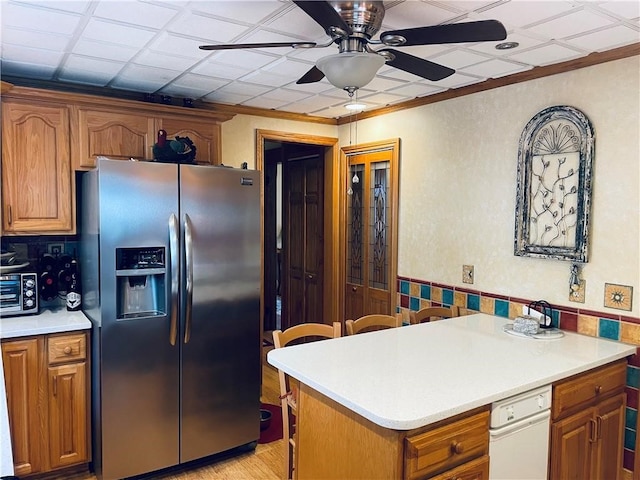 kitchen with ceiling fan, light hardwood / wood-style floors, and stainless steel fridge with ice dispenser