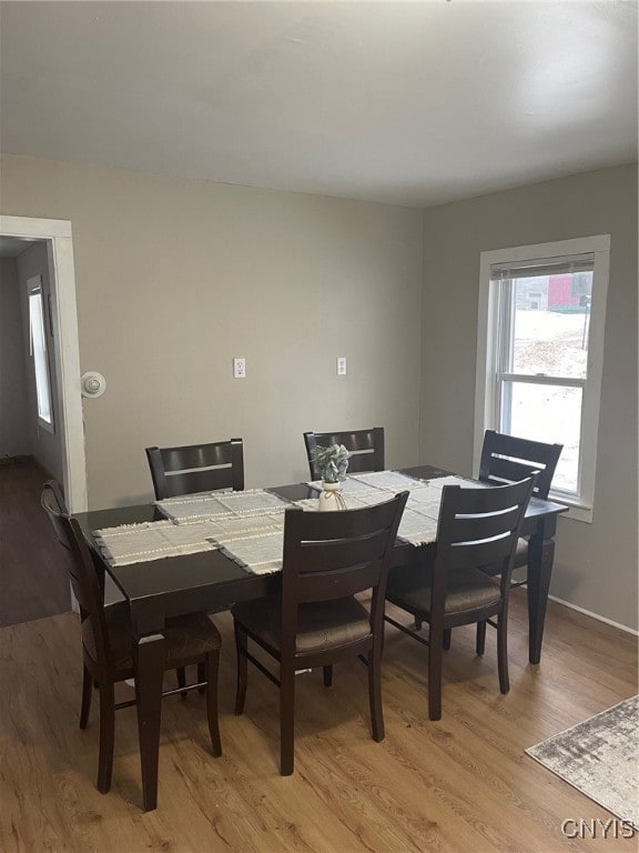 dining room featuring light hardwood / wood-style floors