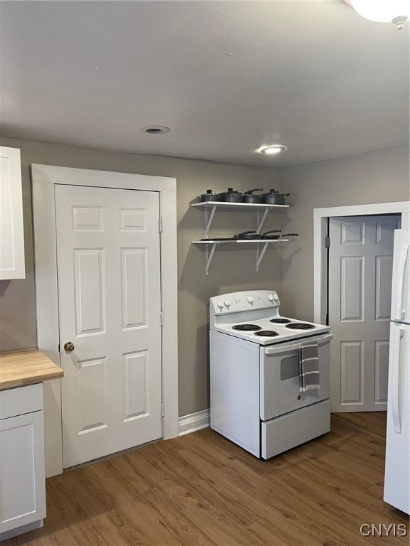 laundry room featuring wood-type flooring