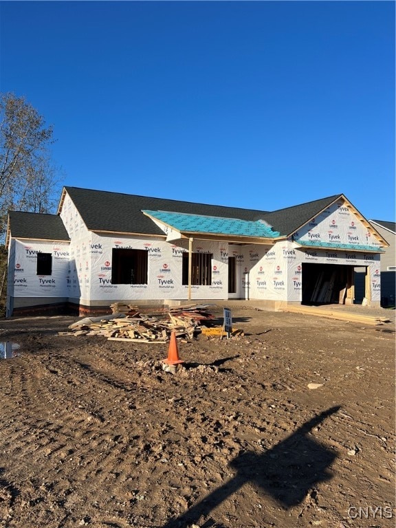 property under construction with a garage