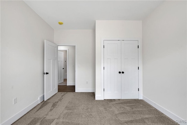 LOT58 Chillingham Way, Lysander, NY 13027 - unfurnished bedroom with carpet flooring, baseboards, and a closet