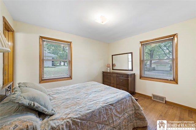 bedroom featuring light hardwood / wood-style floors