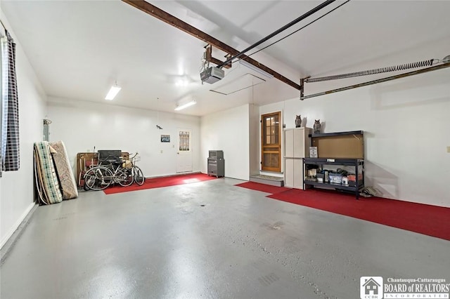 69 Cottage St Unit S, Pomfret, NY 14063 - garage featuring a garage door opener