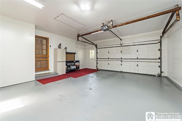 69 Cottage St Unit S, Pomfret, NY 14063 - garage featuring a garage door opener
