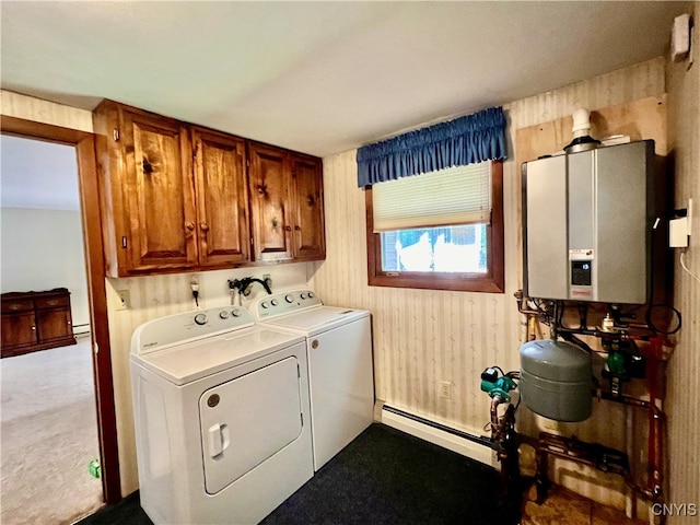 laundry area with washing machine and clothes dryer, a baseboard heating unit, cabinets, light carpet, and water heater