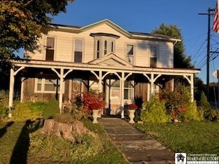 view of front of property featuring a porch