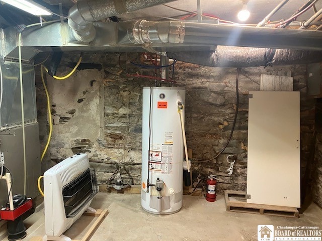 utilities featuring water heater and heating unit