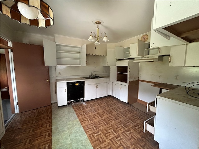 kitchen with pendant lighting, dark parquet floors, white cabinets, and dishwasher