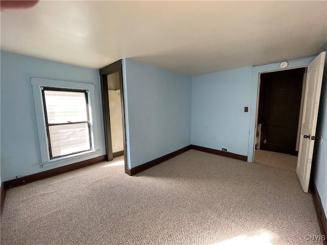 unfurnished room with carpet