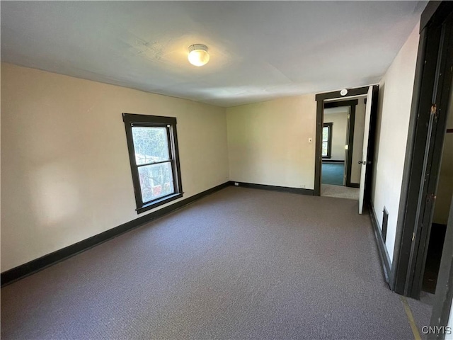 empty room with carpet floors