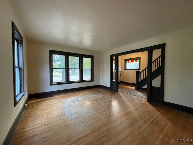 spare room featuring hardwood / wood-style flooring