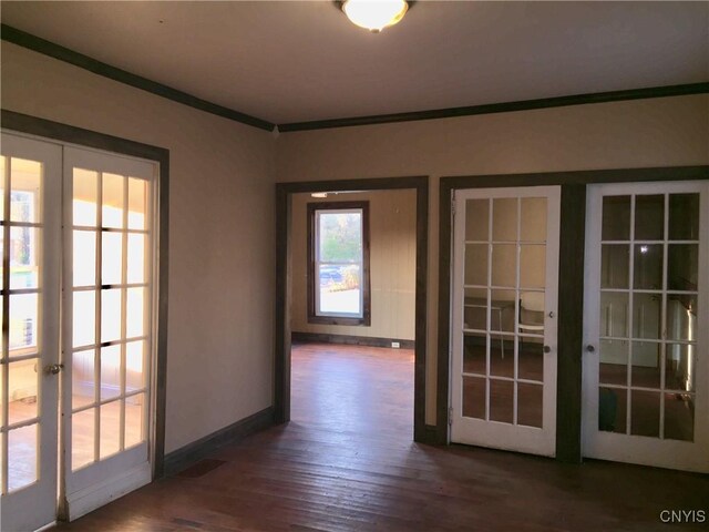 6179 State Highway 29a, Stratford, NY 13329 - spare room with french doors, ornamental molding, and wood finished floors