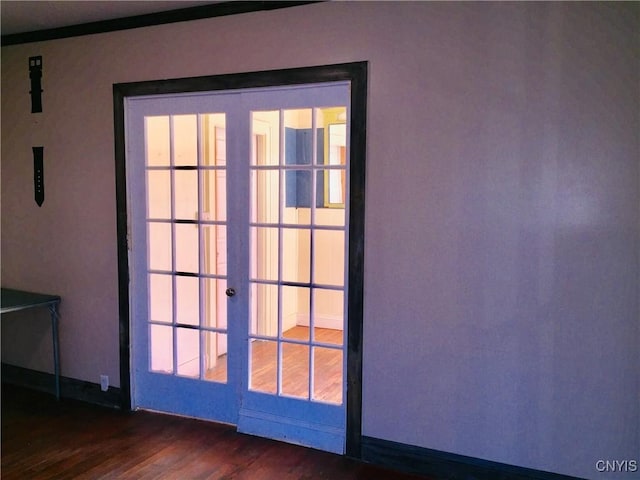 6179 State Highway 29a, Stratford, NY 13329 - doorway to outside with dark wood-style floors and baseboards