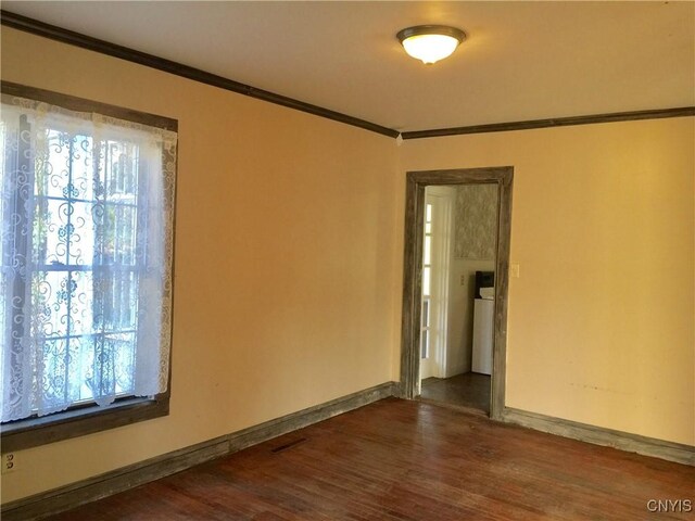 6179 State Highway 29a, Stratford, NY 13329 - empty room with crown molding, dark wood-style flooring, and healthy amount of natural light