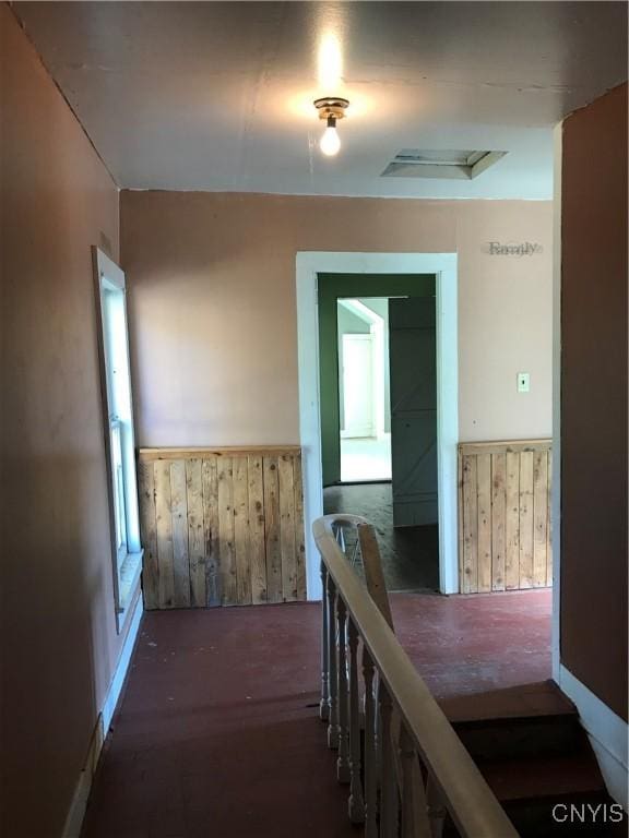 6179 State Highway 29a, Stratford, NY 13329 - corridor featuring wainscoting, wood walls, and an upstairs landing