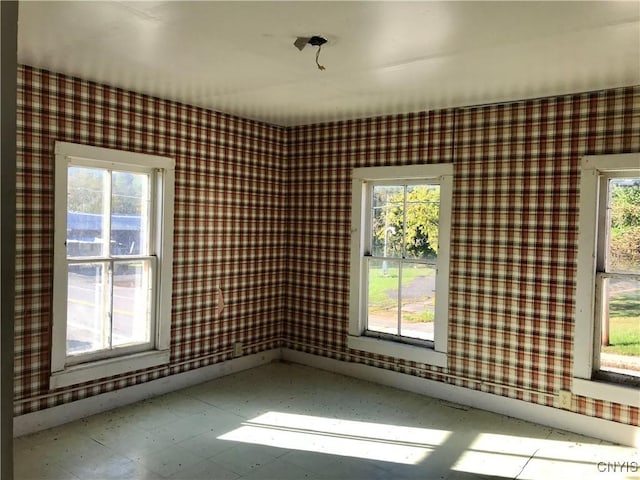 6179 State Highway 29a, Stratford, NY 13329 - unfurnished room featuring wallpapered walls and tile patterned floors