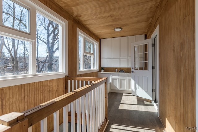 sunroom with wood ceiling