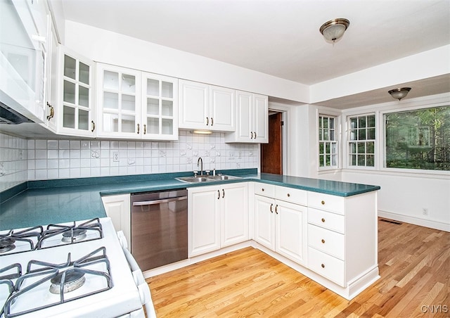 kitchen featuring white appliances, light hardwood / wood-style floors, white cabinets, and sink