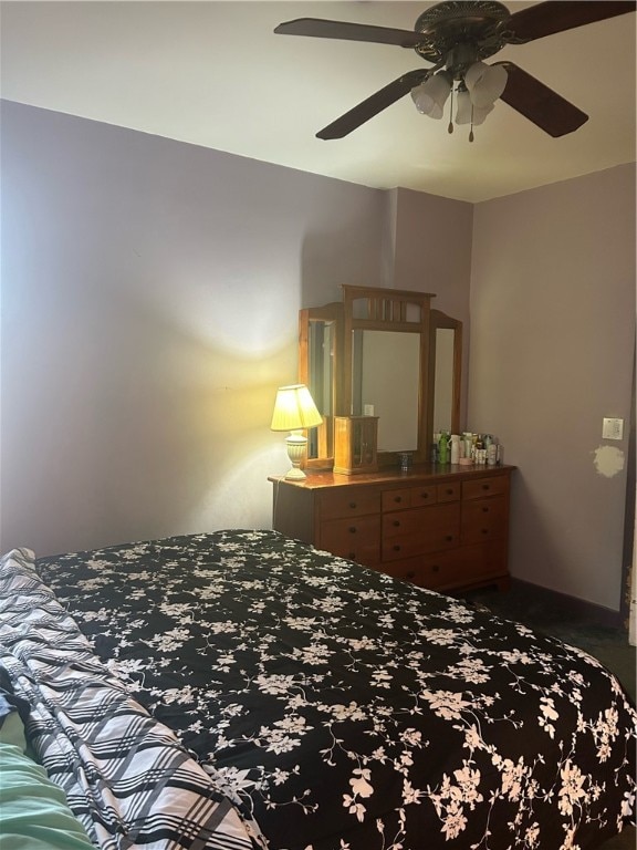 bedroom featuring ceiling fan