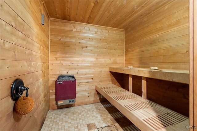 view of sauna featuring wooden walls and wood ceiling