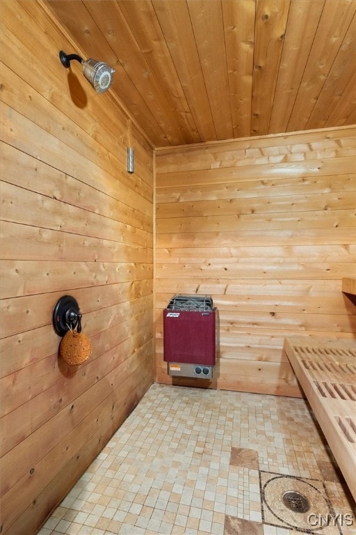 view of sauna featuring wood walls and wooden ceiling