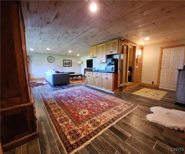 unfurnished living room with wooden ceiling, dark hardwood / wood-style floors, and sink