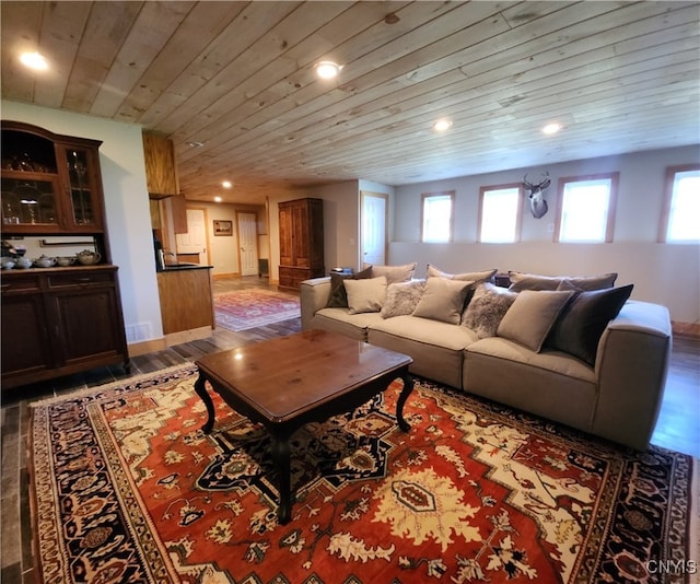 living room featuring hardwood / wood-style floors and wooden ceiling