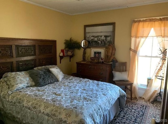 bedroom featuring crown molding