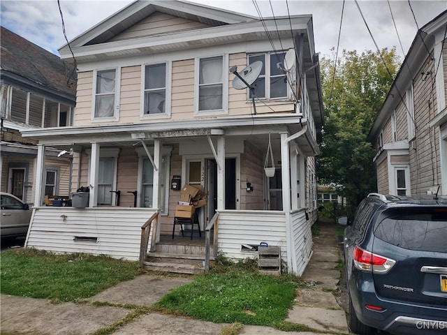 multi unit property featuring covered porch