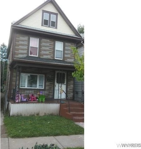 view of property with a porch