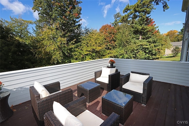 wooden deck with an outdoor hangout area