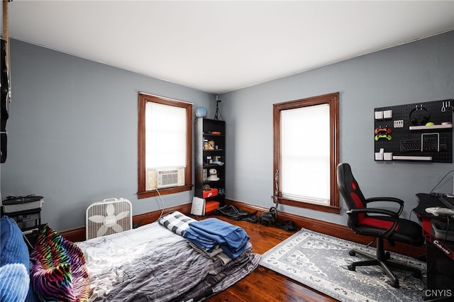 bedroom featuring hardwood / wood-style floors