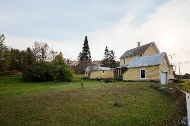 view of yard with a garage