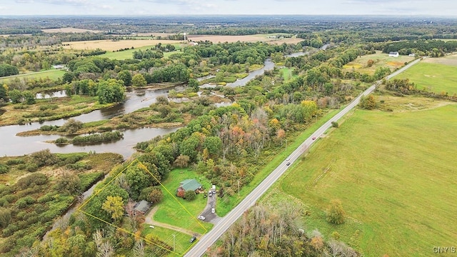 bird's eye view with a water view and a rural view