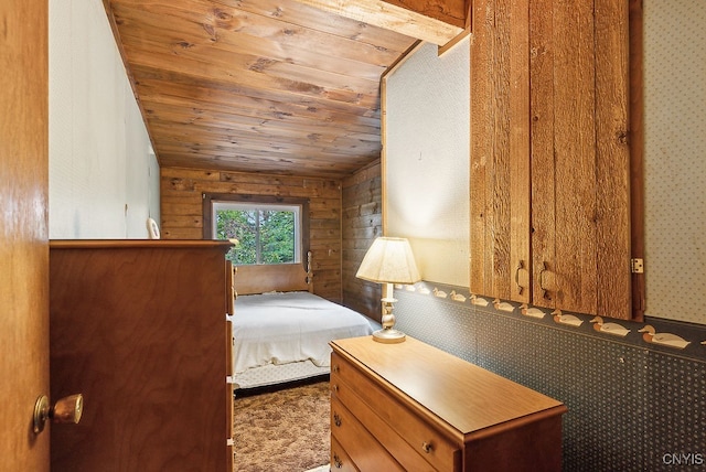 unfurnished bedroom featuring wood walls, wooden ceiling, and vaulted ceiling