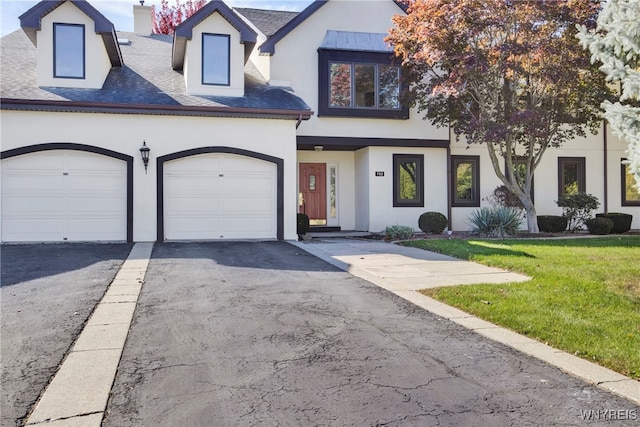 view of front of home with a front lawn